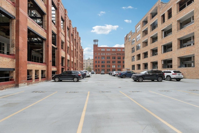 view of property with uncovered parking