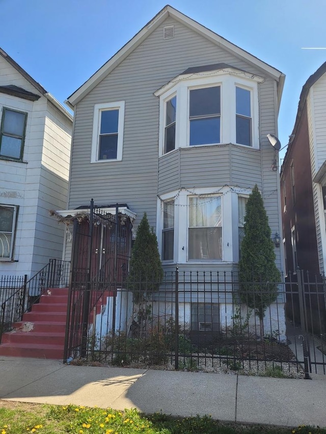 view of front of property with a fenced front yard