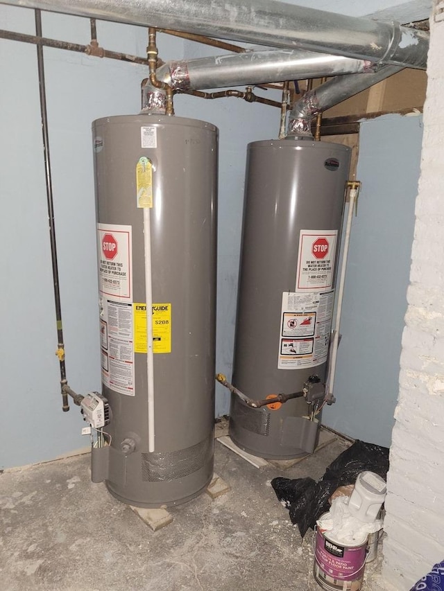utility room featuring gas water heater