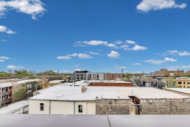 view of yard featuring a view of city