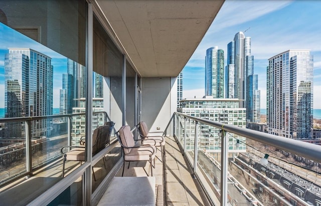 balcony featuring a city view