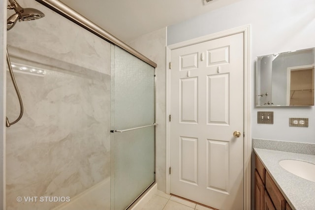 3115 Town Square Dr Unit 303, Rolling Meadows, IL 60008 - full bath featuring a shower stall, tile patterned flooring, and vanity