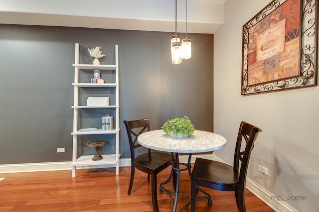 893 S Plum Grove Rd, Palatine, IL 60067 - dining room with wood finished floors and baseboards