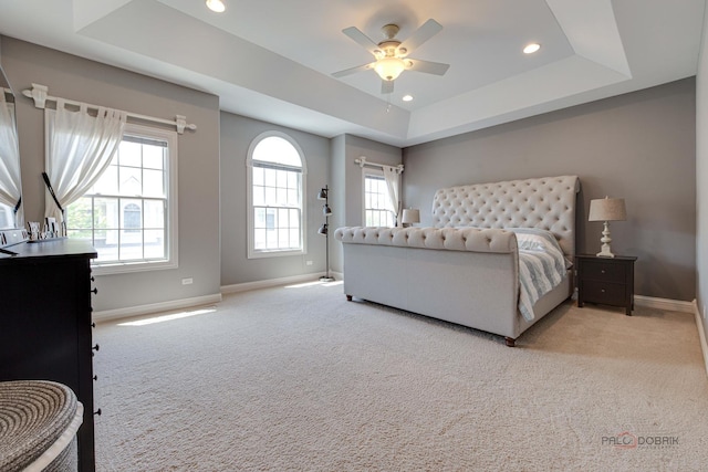 893 S Plum Grove Rd, Palatine, IL 60067 - bedroom with baseboards, a tray ceiling, carpet floors, recessed lighting, and multiple windows