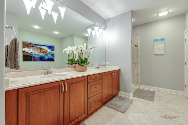 893 S Plum Grove Rd, Palatine, IL 60067 - full bath featuring a shower stall, tile patterned flooring, double vanity, baseboards, and a chandelier