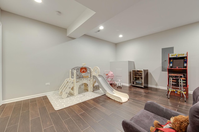 893 S Plum Grove Rd, Palatine, IL 60067 - playroom with wood tiled floors, recessed lighting, baseboards, beverage cooler, and electric panel