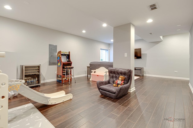 893 S Plum Grove Rd, Palatine, IL 60067 - living room featuring baseboards, wood finished floors, electric panel, and recessed lighting