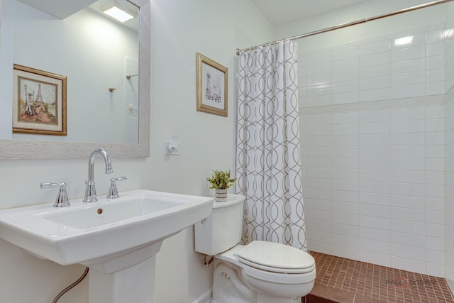 893 S Plum Grove Rd, Palatine, IL 60067 - bathroom with toilet, tiled shower, and a sink