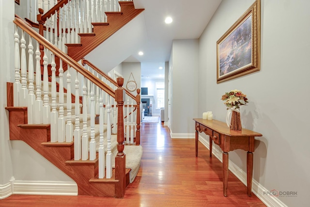 893 S Plum Grove Rd, Palatine, IL 60067 - staircase featuring baseboards, wood finished floors, and recessed lighting