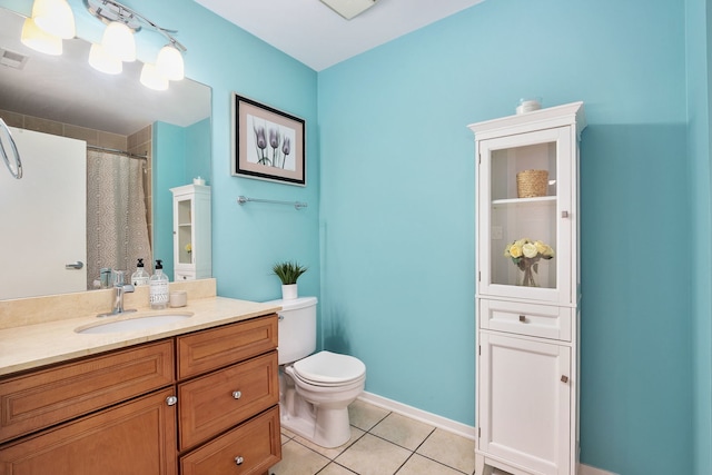 full bath with tile patterned floors, toilet, vanity, a shower with curtain, and baseboards