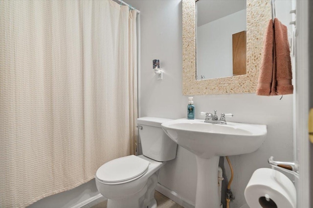 304 W Elm St, Fairbury, IL 61739 - full bath with toilet and a shower with shower curtain