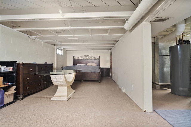 304 W Elm St, Fairbury, IL 61739 - bedroom featuring gas water heater and dark speckled floor