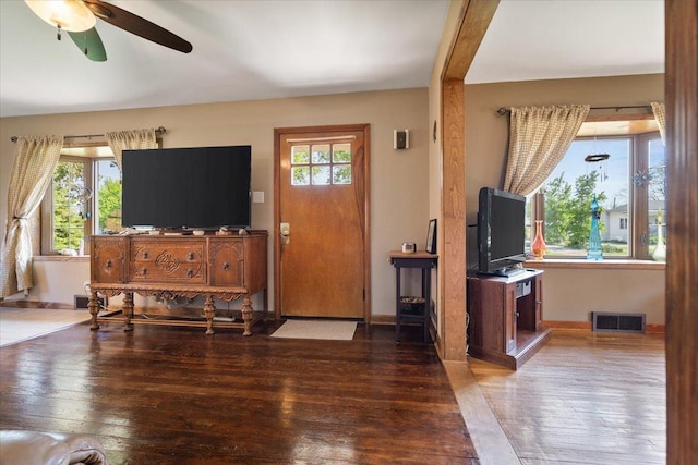 304 W Elm St, Fairbury, IL 61739 - living area with wood-type flooring, ceiling fan, and baseboards