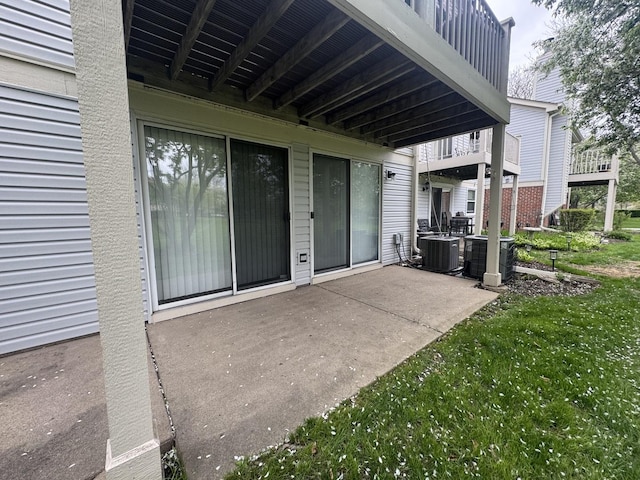 view of patio / terrace featuring central air condition unit and a balcony