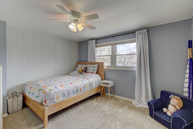 13319 S Mackinaw Ave, Chicago, IL 60633 - bedroom featuring an accent wall, ceiling fan, carpet, and baseboards
