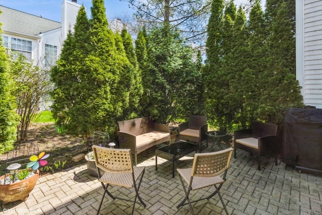 view of patio / terrace with a grill and outdoor lounge area