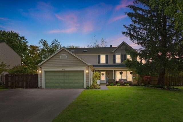 1411 Yosemite Pkwy, Algonquin, IL 60102 - view of front of house with asphalt driveway and a garage