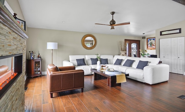 4690 W 130th Ct, Alsip, IL 60803 - living area featuring ceiling fan, a stone fireplace, wood finished floors, and vaulted ceiling