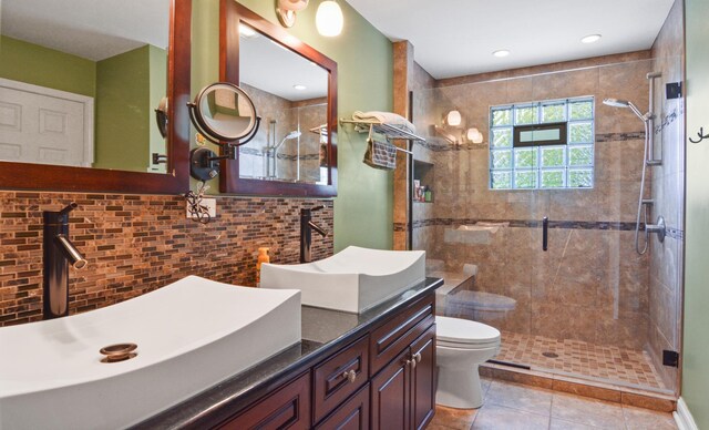 4690 W 130th Ct, Alsip, IL 60803 - full bath with toilet, a shower stall, decorative backsplash, tile patterned floors, and vanity