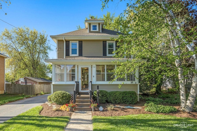 759 E Wilson St, Batavia, IL 60510 - american foursquare style home featuring fence and a shingled roof