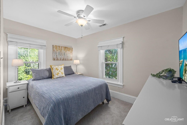 759 E Wilson St, Batavia, IL 60510 - bedroom featuring carpet floors, multiple windows, baseboards, and ceiling fan