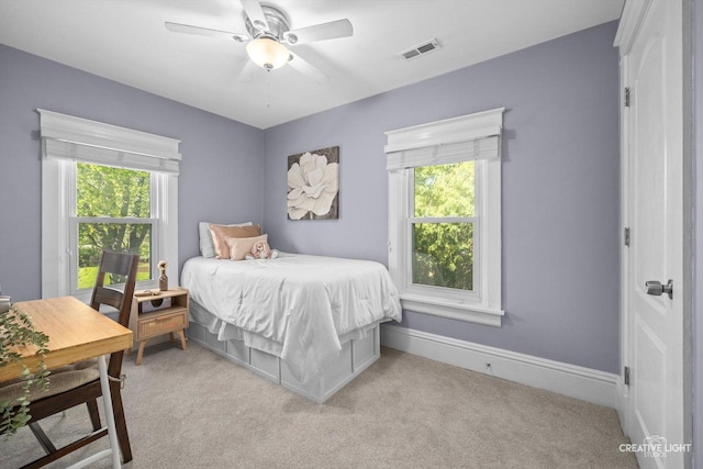 759 E Wilson St, Batavia, IL 60510 - bedroom featuring light carpet, multiple windows, and ceiling fan