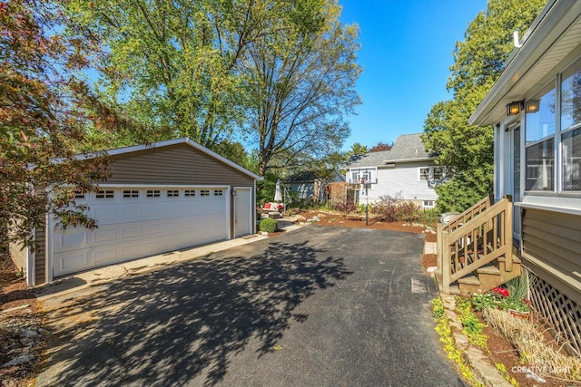 759 E Wilson St, Batavia, IL 60510 - view of home's exterior with an outbuilding and a detached garage