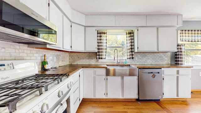 121 Northern Ter, Island Lake, IL 60042 - kitchen featuring appliances with stainless steel finishes, plenty of natural light, and white cabinetry