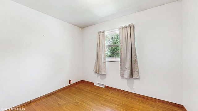 121 Northern Ter, Island Lake, IL 60042 - empty room with light wood-style flooring and baseboards