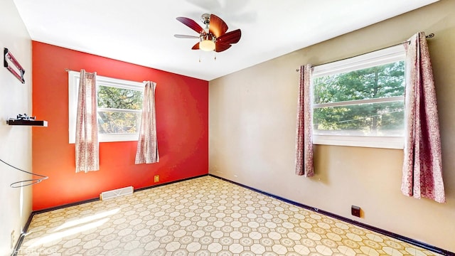 121 Northern Ter, Island Lake, IL 60042 - empty room with ceiling fan and baseboards