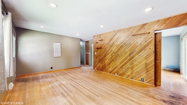 121 Northern Ter, Island Lake, IL 60042 - empty room with wooden walls, wood finished floors, recessed lighting, and baseboards