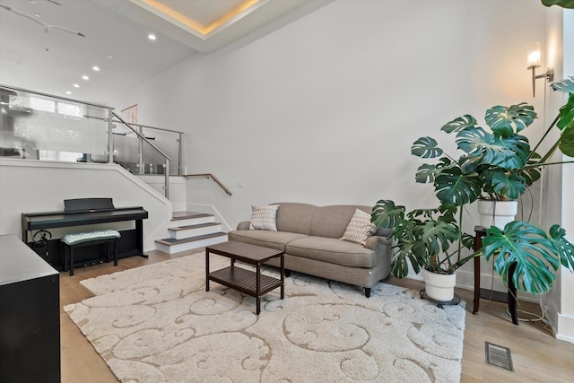 6223 S Ellis Ave, Chicago, IL 60637 - living area with stairway, wood finished floors, and recessed lighting