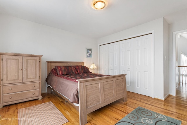 5657 N Crescent Ave, Norwood Park, IL 60631 - bedroom with a closet, light wood-type flooring, and baseboards