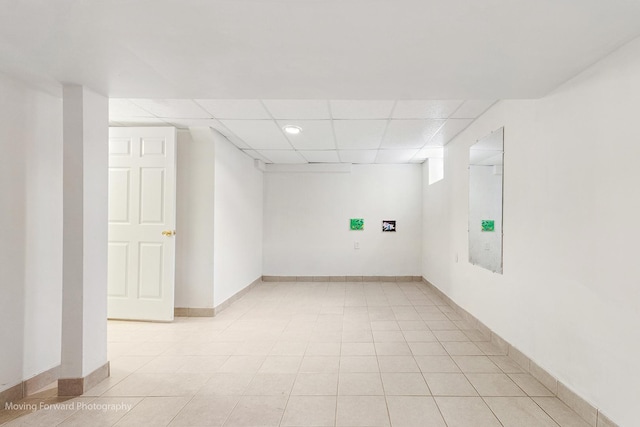 5657 N Crescent Ave, Norwood Park, IL 60631 - spare room with light tile patterned floors, a drop ceiling, and baseboards