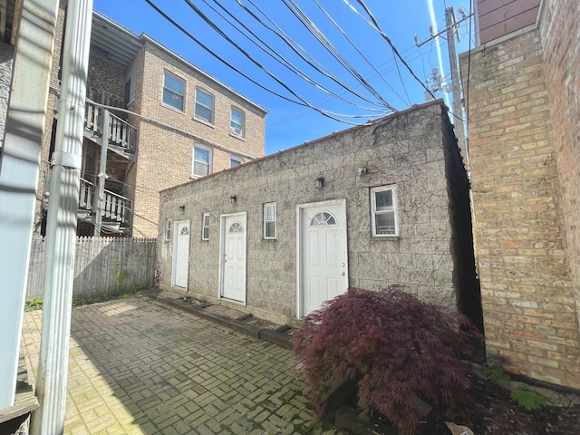 2227 N Bissell St, Chicago, IL 60614 - property entrance with a patio area and fence