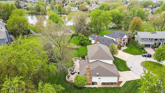 bird's eye view with a water view and a residential view