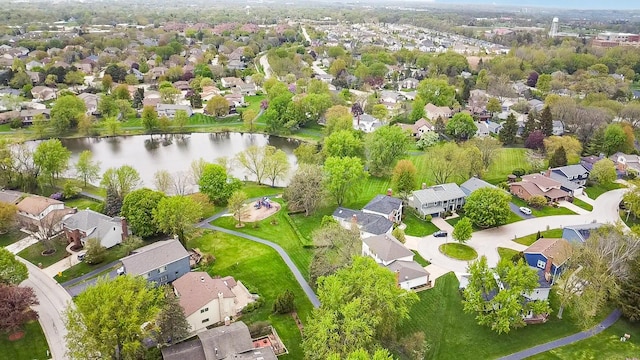 aerial view of residential area with a nearby body of water