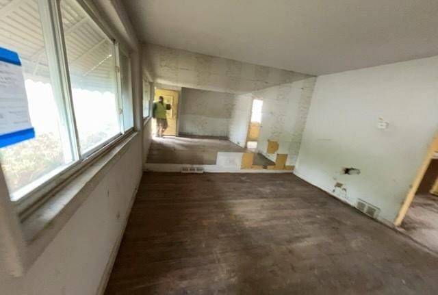 interior space featuring a healthy amount of sunlight and visible vents