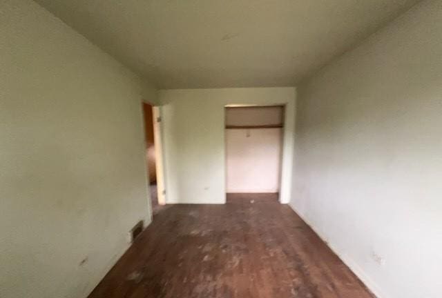 interior space featuring visible vents and wood finished floors