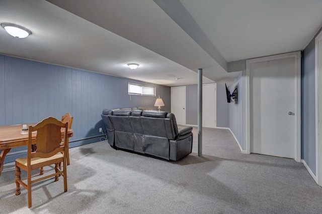 carpeted living area featuring a baseboard radiator