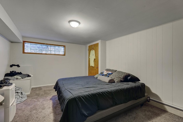 bedroom featuring a baseboard radiator and carpet
