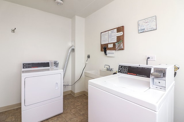 5300 Walnut Ave Unit 4D, Downers Grove, IL 60515 - shared laundry area with washing machine and clothes dryer, baseboards, light tile patterned floors, and a sink