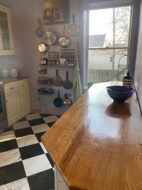 dining area with light floors and a wealth of natural light