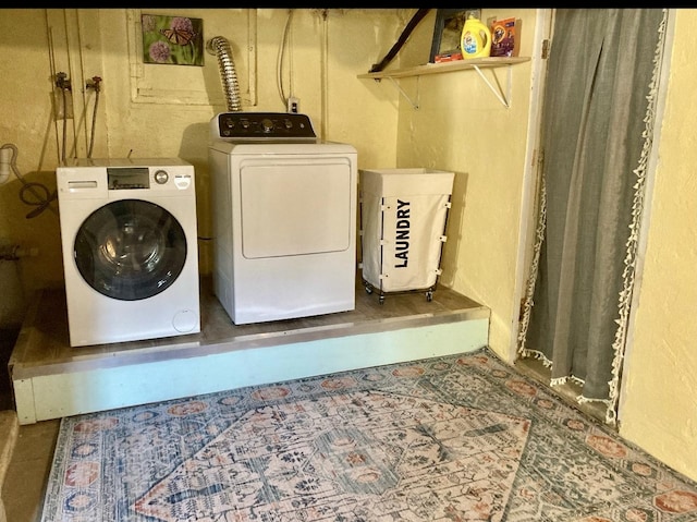 laundry area with washer and dryer and laundry area