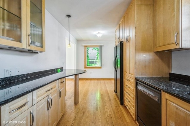 5116 N New England Ave, Chicago, IL 60656 - kitchen with black appliances, light wood-type flooring, dark stone countertops, and hanging light fixtures