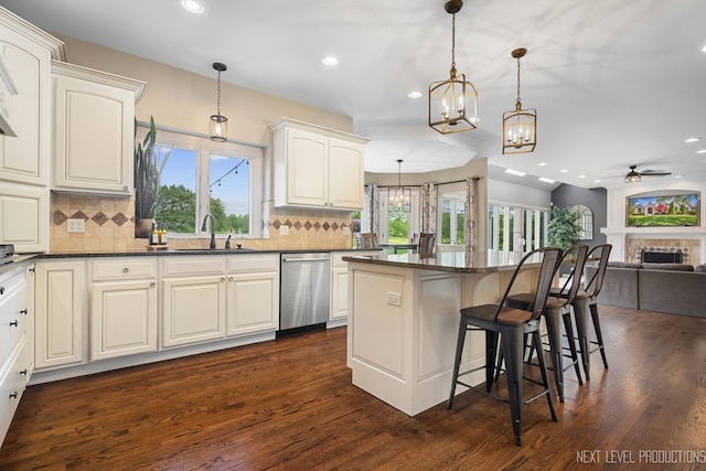 2401 Legacy Dr, Aurora, IL 60502 - kitchen with dishwasher, a sink, a chandelier, ceiling fan, and open floor plan