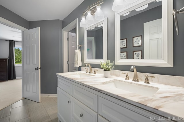 2401 Legacy Dr, Aurora, IL 60502 - full bath with double vanity and baseboards