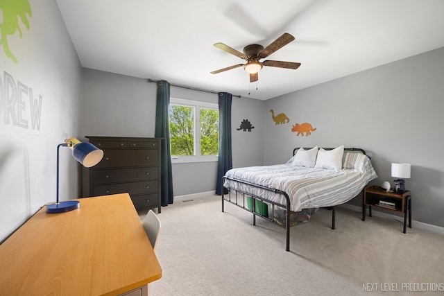 2401 Legacy Dr, Aurora, IL 60502 - carpeted bedroom featuring baseboards and a ceiling fan