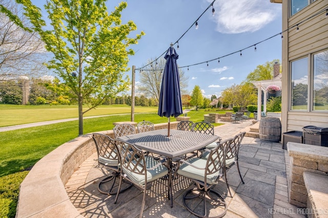 2401 Legacy Dr, Aurora, IL 60502 - view of patio / terrace featuring outdoor dining space
