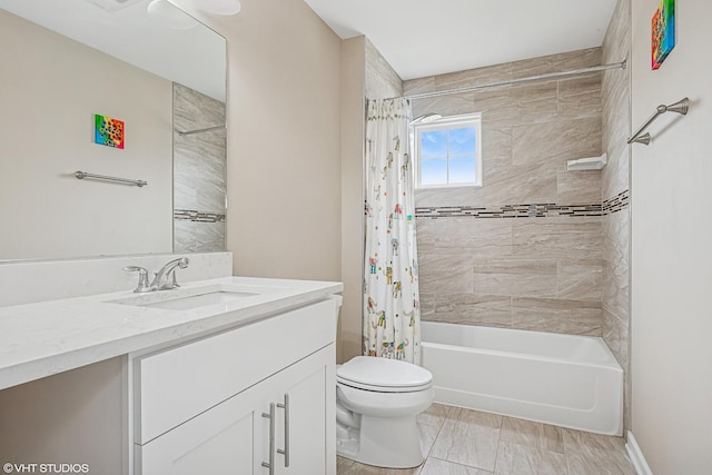 bathroom featuring toilet, vanity, and shower / bath combo with shower curtain